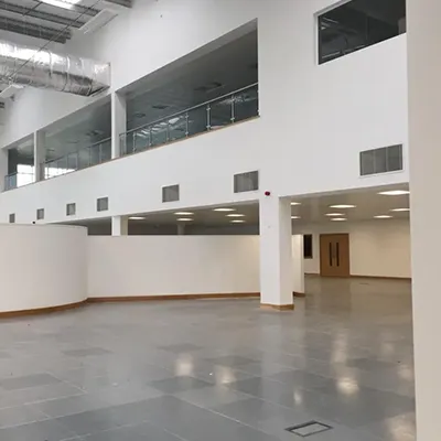 a large empty building with a lot of windows