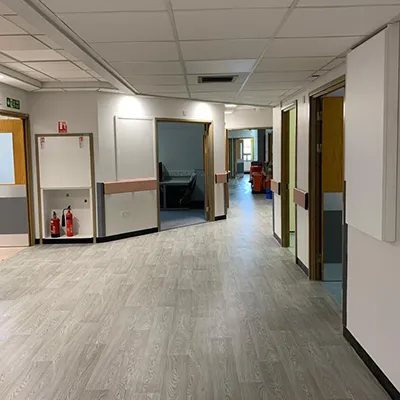 a large empty room with a lot of doors