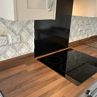 a kitchen with a stove and a counter top